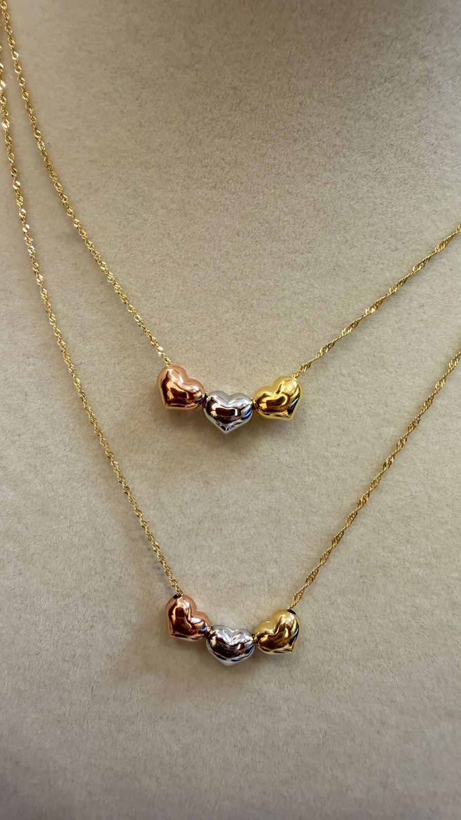 CADENA TRIO CORAZONES 1.4GR 10K